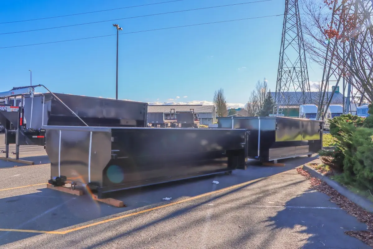 Roll-off dumpster ready for waste disposal at job site for Construction Dumpster Rental in Fredericksburg